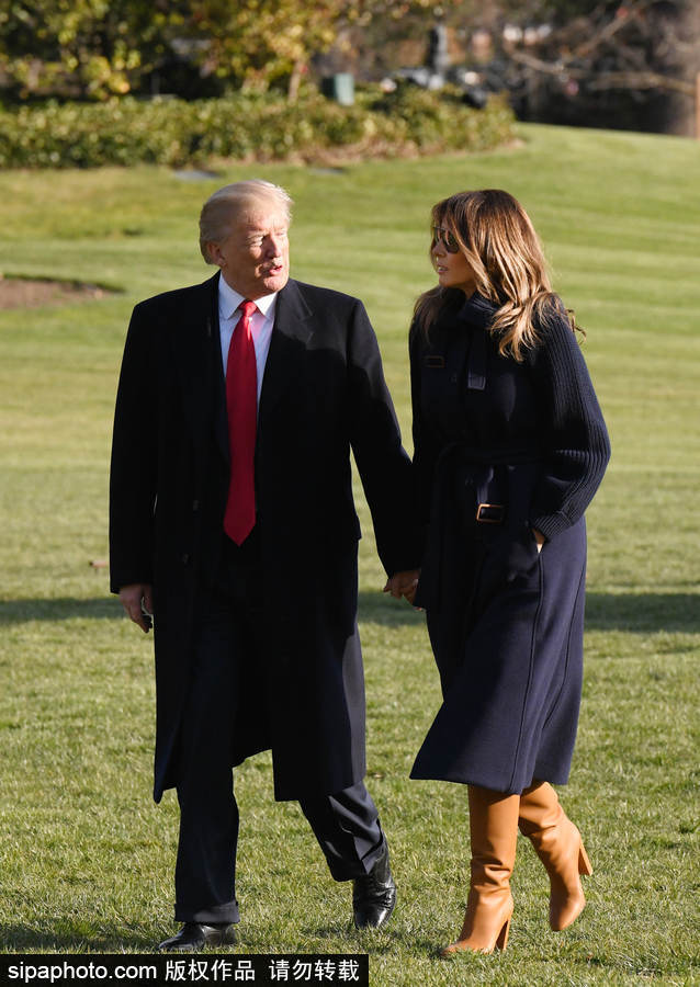 特朗普又來(lái)秀恩愛(ài)了 與第一夫人白宮草坪手牽手