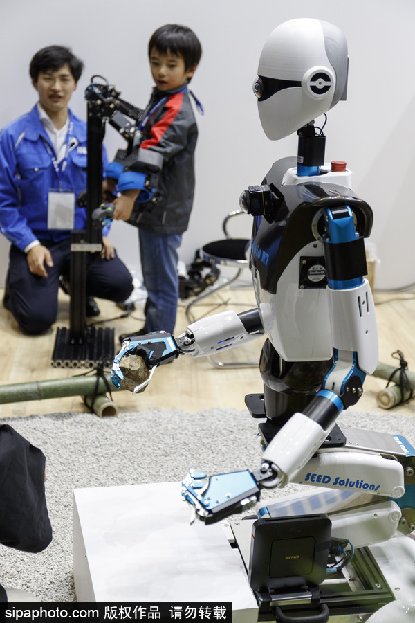 “阿童木”外形機器人吸引眼球！2018年世界機器人峰會在東京舉行